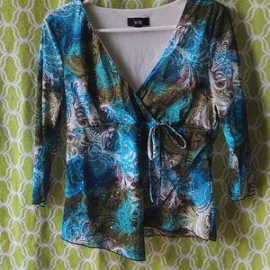 Women's patterned top with sequin accent